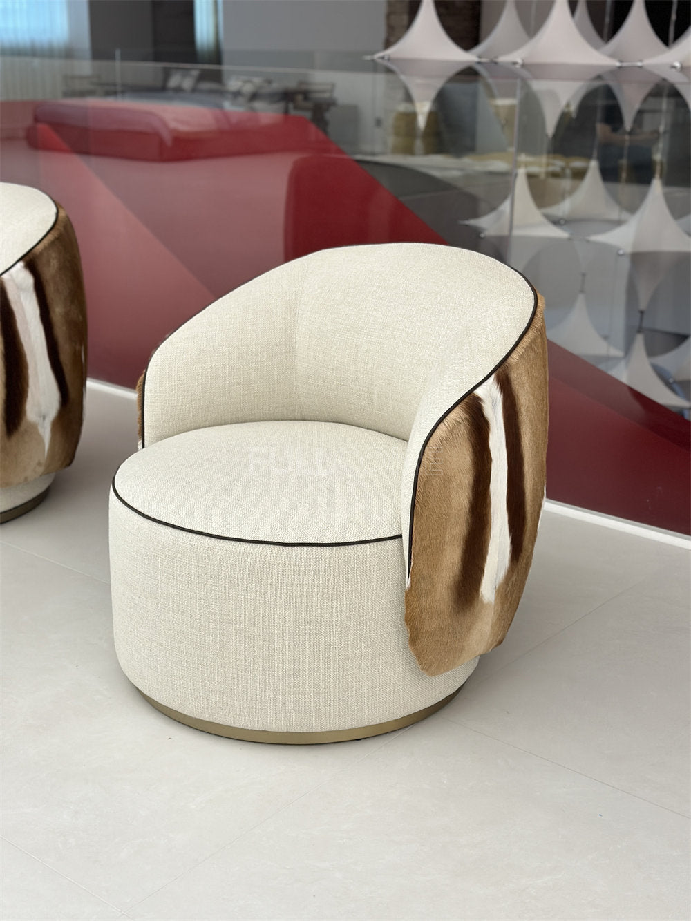 The Hide Drape Swivel Chair