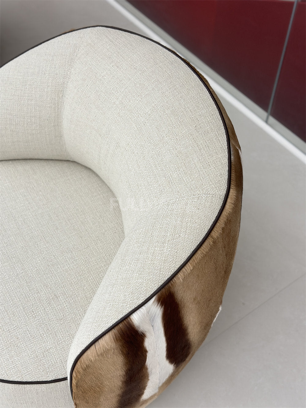 The Hide Drape Swivel Chair