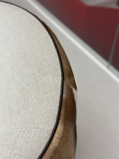 The Hide Drape Swivel Chair
