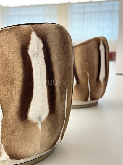 The Hide Drape Swivel Chair