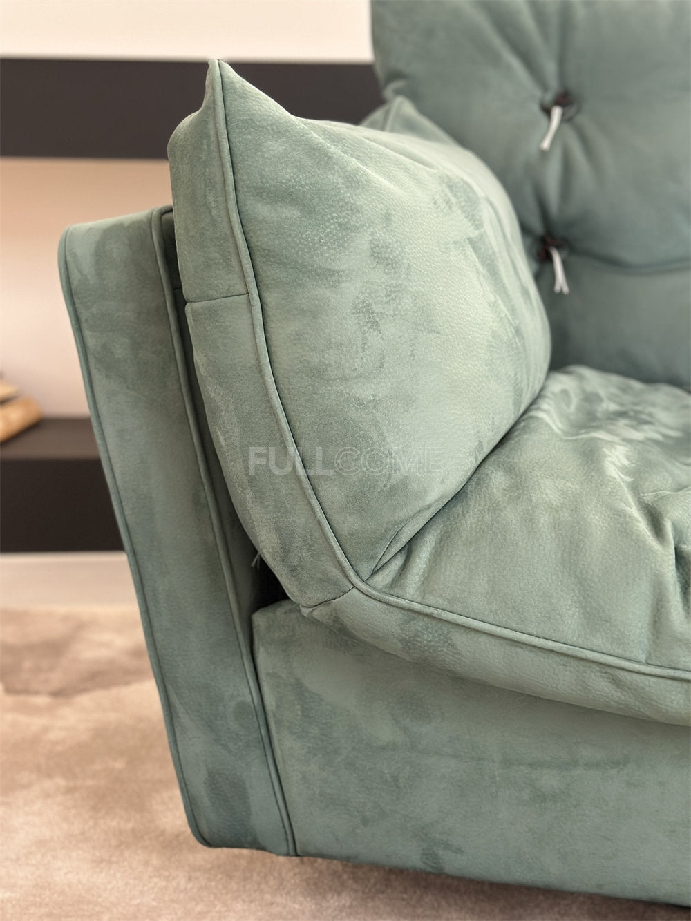 The Loop Button Lounge Chair