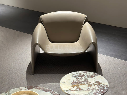 The Plunge Arm Lounge Chair