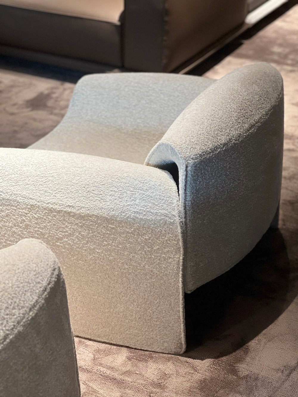 The Plunge Arm Lounge Chair