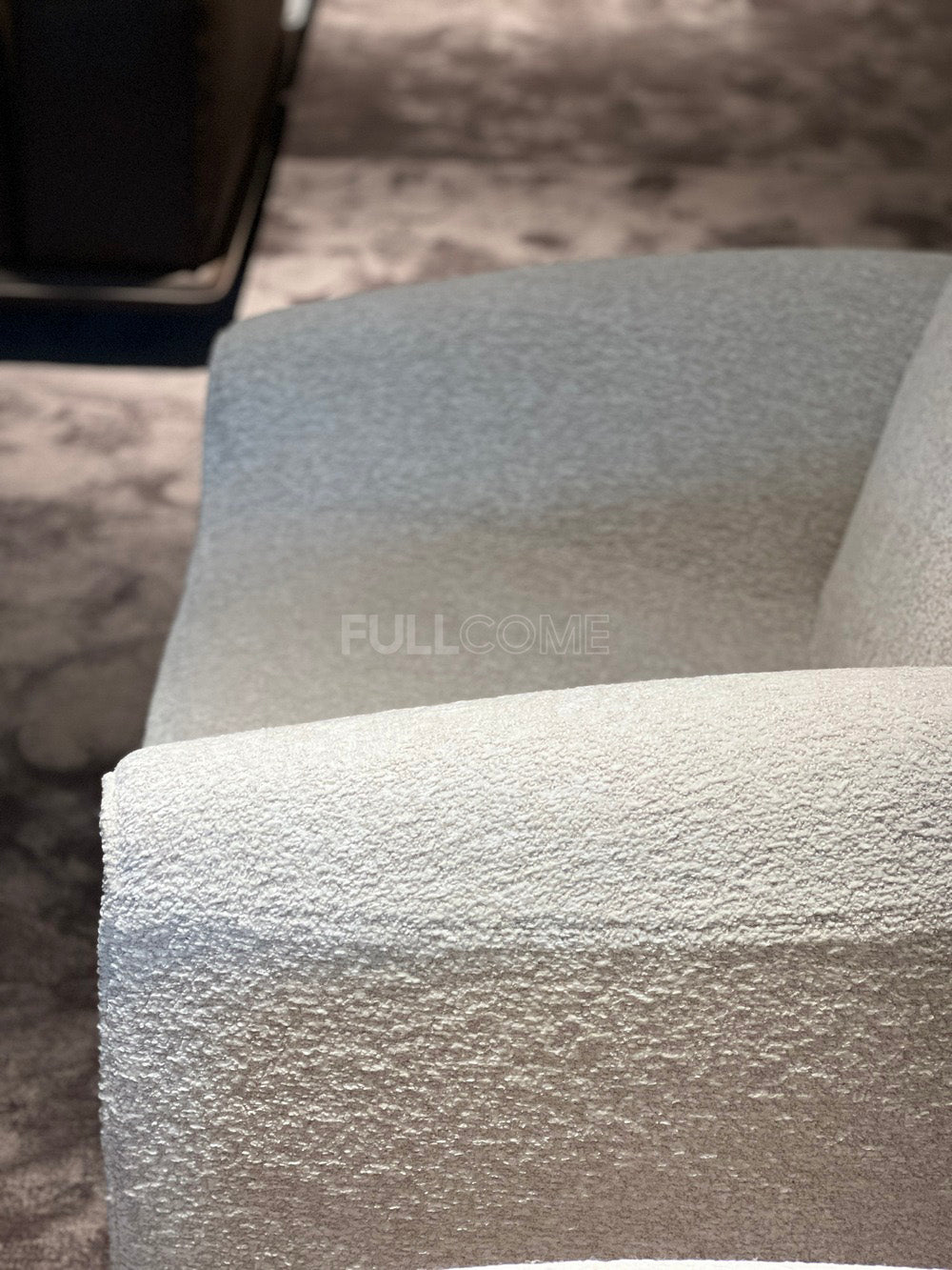The Plunge Arm Lounge Chair