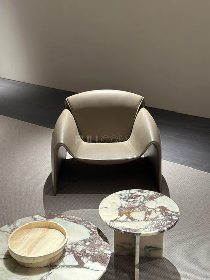 The Plunge Arm Lounge Chair