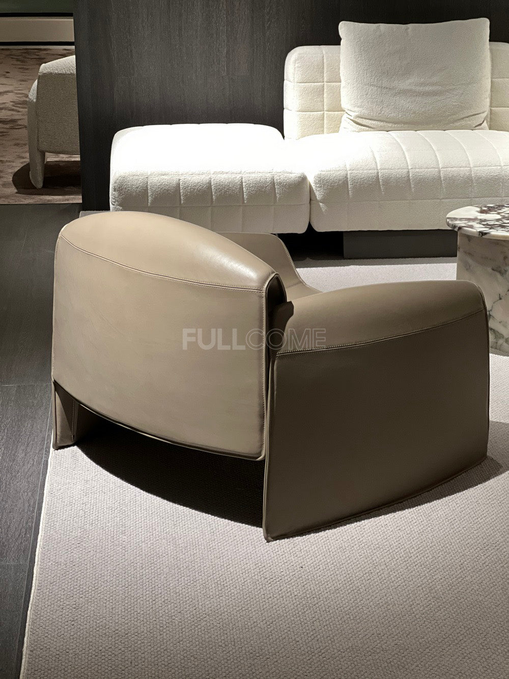 The Plunge Arm Lounge Chair