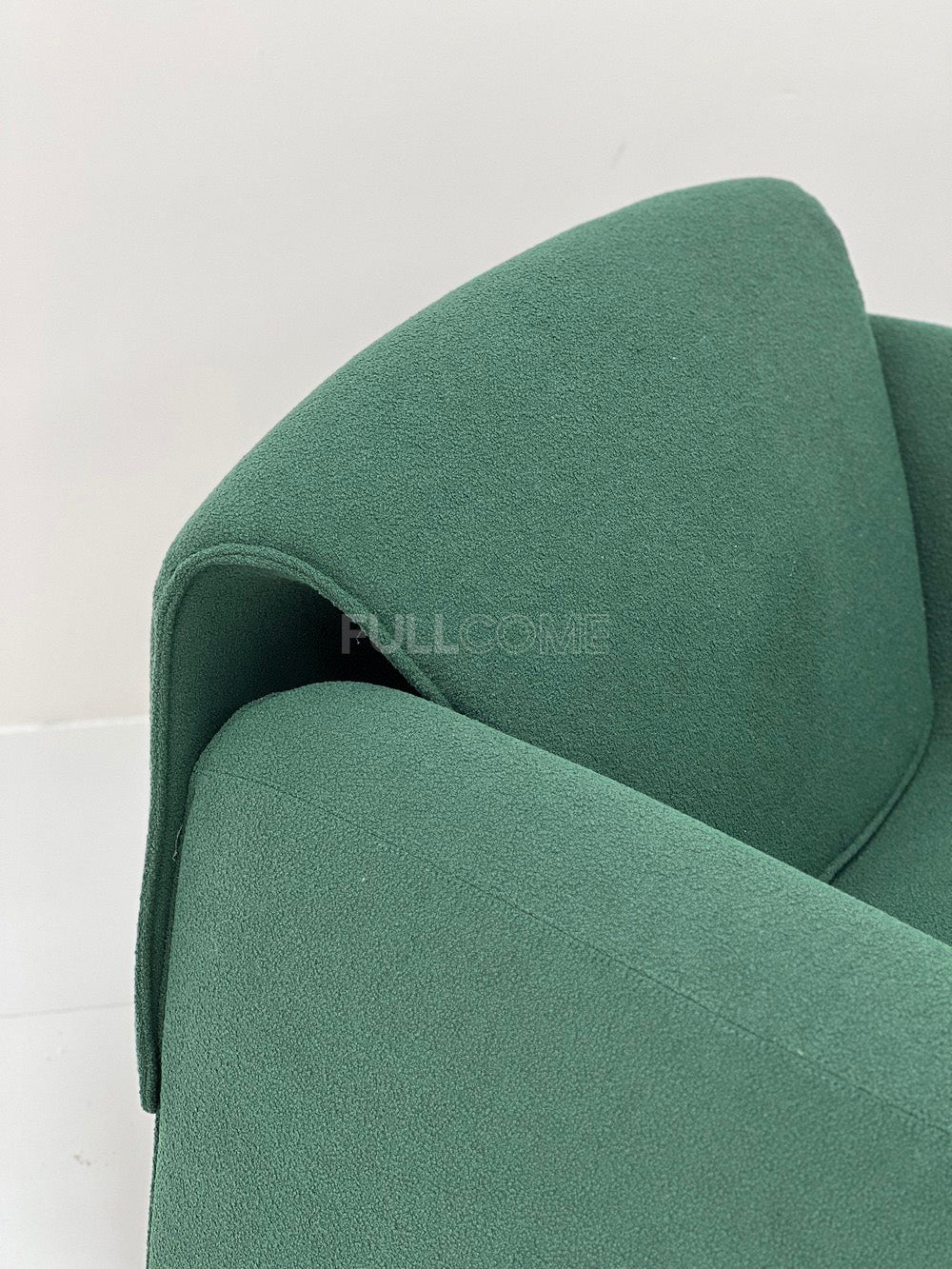 The Horseshoe Arc Lounge Chair