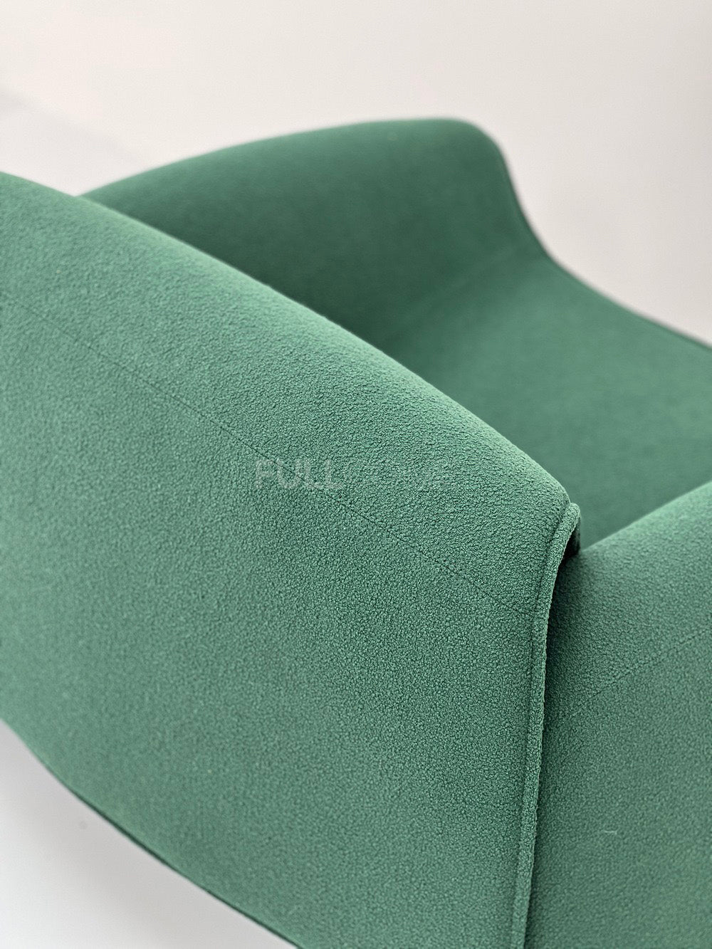 The Horseshoe Arc Lounge Chair