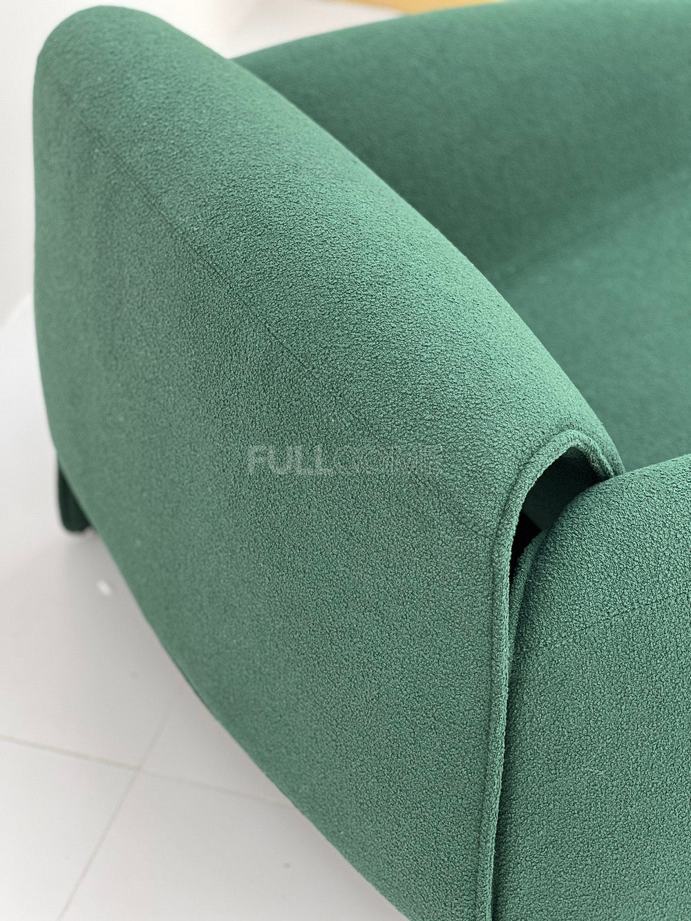 The Horseshoe Arc Lounge Chair