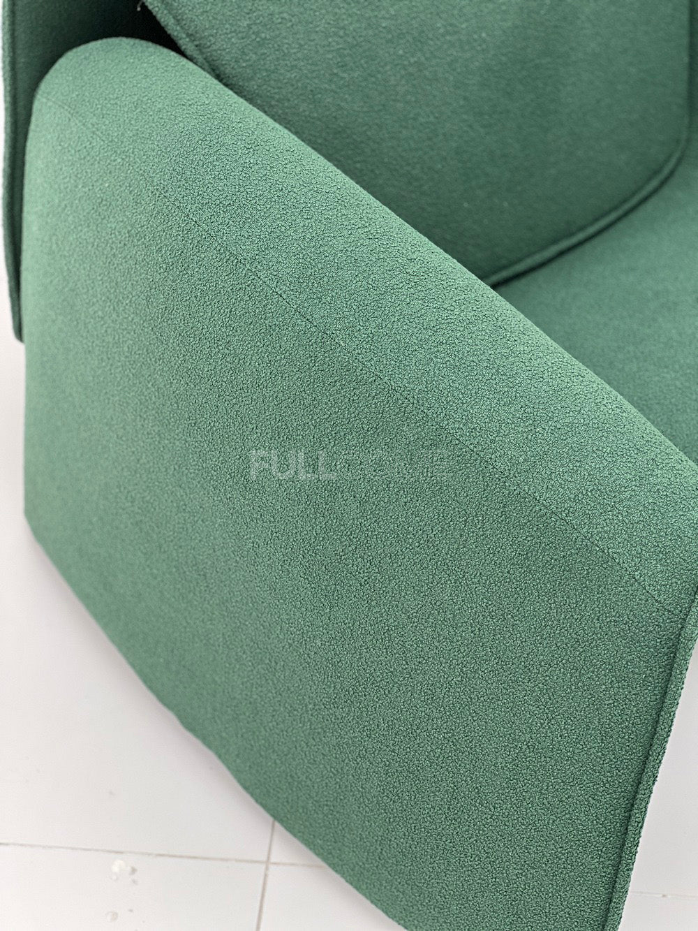 The Horseshoe Arc Lounge Chair