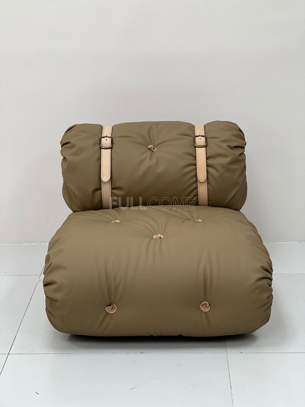 The Buckle Roll Lounge Chair