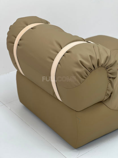 The Buckle Roll Lounge Chair