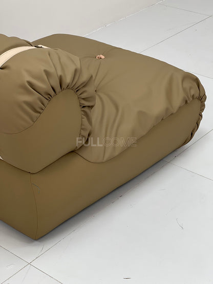 The Buckle Roll Lounge Chair