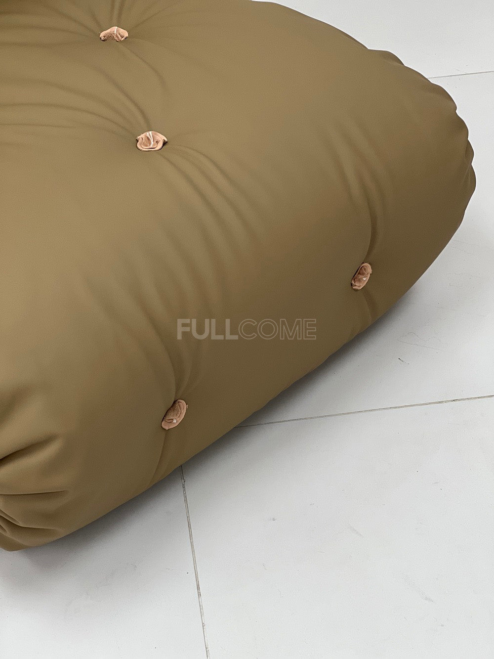 The Buckle Roll Lounge Chair