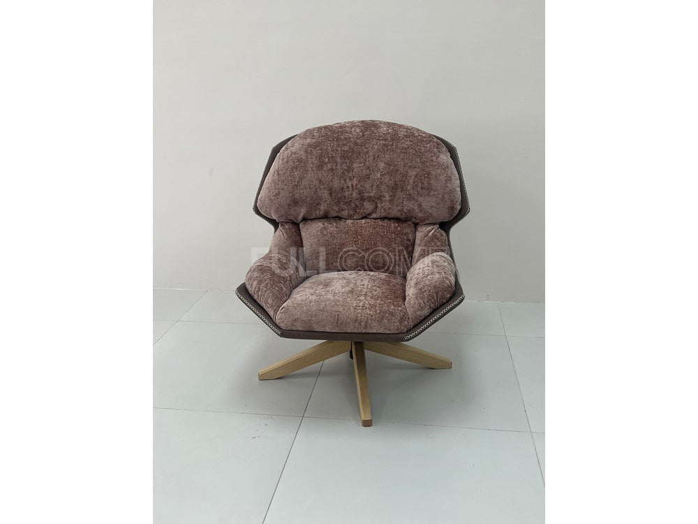 The Rivet Rim Swivel Chair