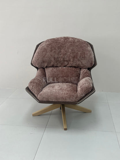 The Rivet Rim Swivel Chair