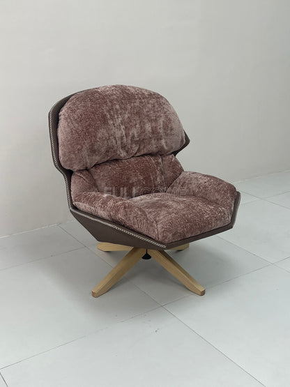 The Rivet Rim Swivel Chair