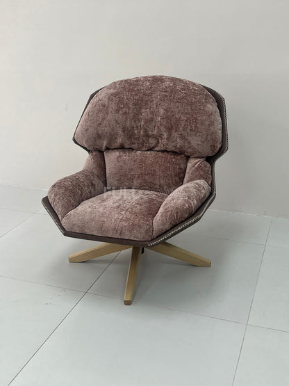 The Rivet Rim Swivel Chair
