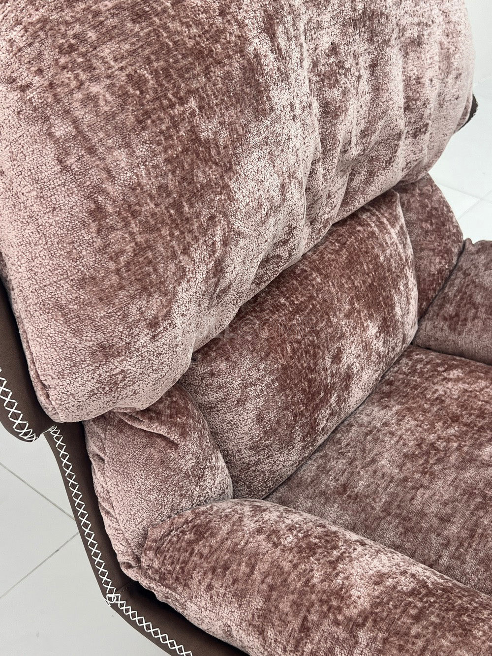 The Rivet Rim Swivel Chair