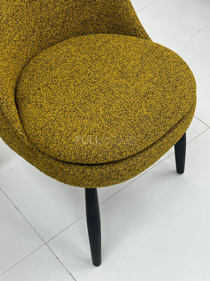 The Mustard Shield Dining Chair